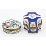 A Continental porcelain oval patch box and cover, painted with flowers and gilt lined scales, flower