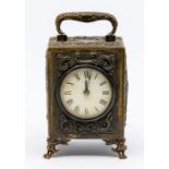 A late Victorian silver and silver gilt cased carriage clock, the case with Rococo embossed