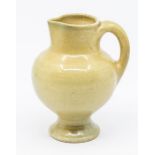 Martin Brothers, a studio pottery jug, inscribed to base 'Martin Bros London Southall', approx