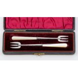 A pair of late Victorian silver and mother-of-pearl oyster forks, by Adie & Lovekin, Birmingham,