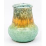 A Ruskin Crystalline vase, conical bulbous form, mottled brown and orange over green, impressed