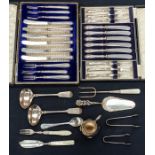 An Edwardian set of six fruit knives and forks, silver handles by William Hutton & Sons,