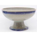 A Poole Studio Pottery pedestal bowl, the grey ground with blue and yellow circles, impressed
