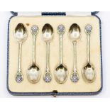 A cased set of six George V Walker & Hall silver-gilt and enamel demitasse spoons, the terminals set