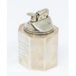 A silver Tiffany & Co table lighter, octagonal plain form, inscribed to side, shell shaped thumb