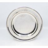 A Victorian silver soup plate, plain circular with reeded rim, the raised border engraved with a