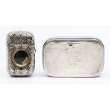 A Victorian silver cushion shaped snuff box, engraved squiqqle work decoration to cover and back,