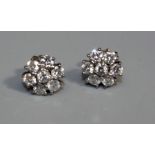 A pair of diamond and 18ct white gold cluster stud earrings, comprising brilliant cut diamonds, with
