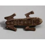 A Greek style silver Frog Brooch, the body engraved with concentric designs with applied pin to