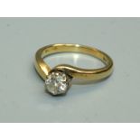 A single stone diamond ring, claw mounted on 18ct gold shank. Approximately 0.5 carats, size K,