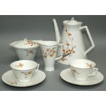 An early / mid 20th century Portuguese porcelain tea service, comprising teapot, cream, lidded