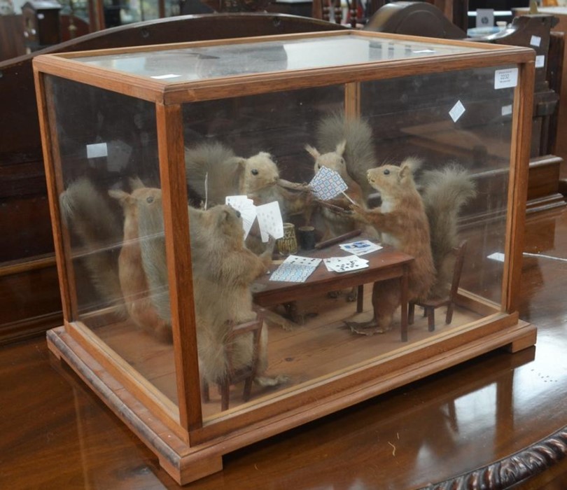 Taxidermy. In the manner of Walter Potter. Victorian group of taxidermy squirrels playing cards,