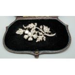 A late Victorian early Edwardian tremblant diamond set spray brooch, comprising a flower cluster