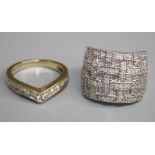 A sterling silver diamond dress Ring, grain set numerous baguette and round brilliant-cut diamonds