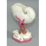 A late 19th century Royal Worcester posy vase fashioned as a nautilus shell on a coral and whelk