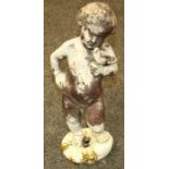 A small late 19th century/early 20th century cast lead garden ornament modelled as a putto with