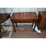 A George III mahogany tea table, fitted with a single drawer, raised on square legs, circa 1770,