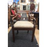 A George III mahogany open armchair, inset seat, raised on square legs together with an early