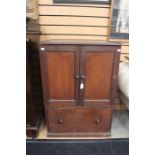 A 19th Century mahogany side cabinet, having two doors enclosing three internal drawers; the