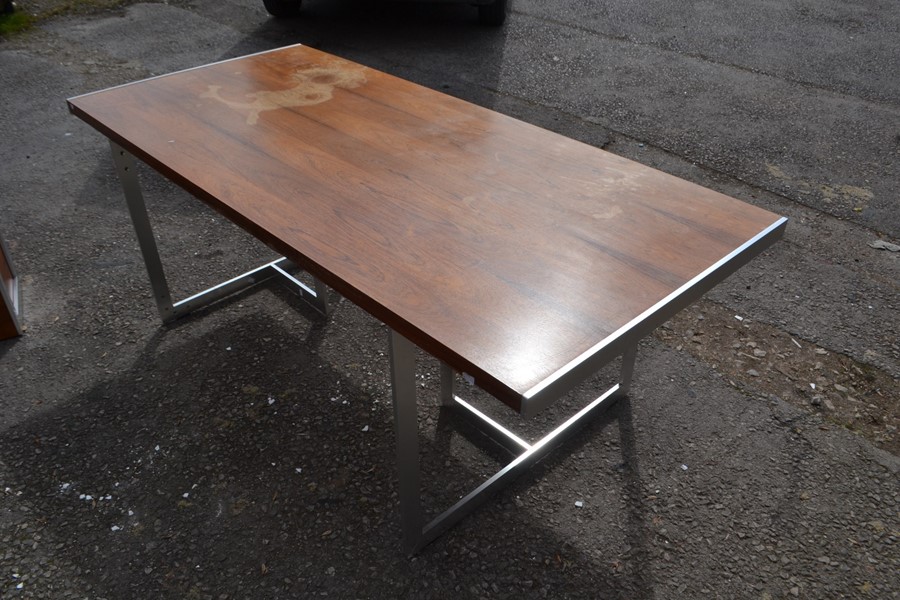 A Scandinavian rosewood refectory table raised on a pair of chrome tripod supports. 71cm H x 199cm W - Image 3 of 5