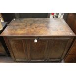 A 17th Century joined oak chest, plank top, panelled front, single storage section, 63cm high,