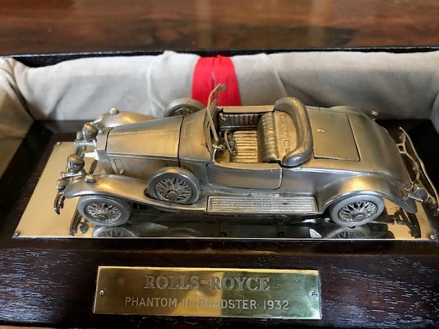 An Elizabeth II sterling silver desk model of a 1932 Rolls-Royce Phantom II Roadster, Magna