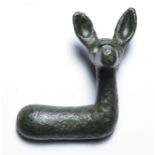 Iron Age deer mount. A late Iron Age zoomorphic bronze mount in the form of a deer right with its