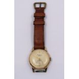 An 18ct gold cased gentleman's wristwatch the dial unnumbed J. W. Benson, London with subsidiary  (