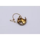 A 9ct gold horse brooch