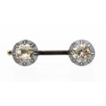 A Georgian diamond set bar brooch, comprising two old European cut diamonds, total diamond weight