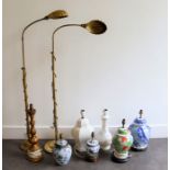 A collection of lamps including floor standing brass students lamps and similar