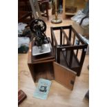 An early 20th Century American C-frame Century Willcox & Gibbs silent sewing machine, with further