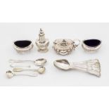 An Edwardian silver condiment set to include: pair of oval salts, pepper pot, mustard pot and cover,