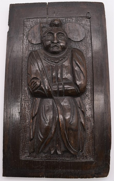 19th century carved wooden panel of a Chinese figure, possibly earlier.