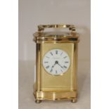 A Jean Renet carriage clock, boxed with key.