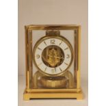 A Jaeger Le Coultre Atoms clock, in brass case, Swiss made, serial number '367589', complete with