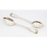 Two 19th Century silver fiddle, thread and shell pattern basting / serving spoons, each engraved