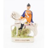 19th century Staffordshire flatback of Wellington on Horse back.