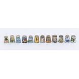 Silver thimbles - twelve silver and enamel thimbles, various makers, dates and designs, including