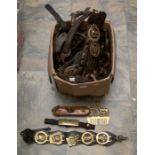 A collection of 19th & 20th Century horse brasses mainly mounted on leather martingales also