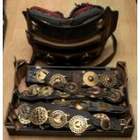 Equestrian Interest: An early 20th Century leather and brass show saddle with brass bridge, rings