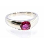 A ruby and platinum set dress ring, comprising an oval ruby approx 5.4 x 6 x 2.5mm, size N1/2, 8.