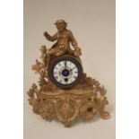 Late 19th century French gilt spectre clock with Porcelain dial, Roman numerals figure of