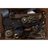 A collection of 19th & mainly early 20th Centuyr horse brasses: loose or mounted on leather