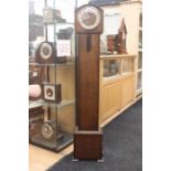 1930s Grandmother clock with key.