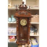 A Vienna walnut veneered wall clock, eight day double train Becka type movement, broken pediment,