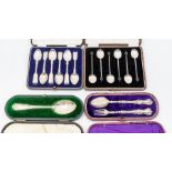 A cased set of six silver teaspoons with embossed shells to handles, London 1942, maker C W Fletcher