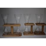 Four Kwak Beer Glasses With Stands.