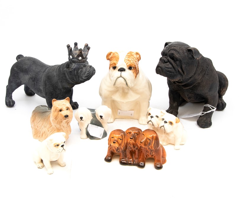 A collection of Beswick Dog figures, comprising of Old English sheep dog figure group, Terrier,