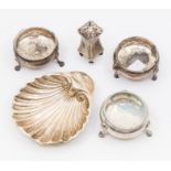 A group of table silver to include: a pair of George III circular salts, on hoof feet, by SM,